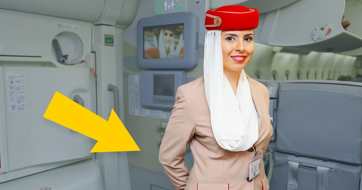 Why the cabin crew keep their arms behind their backs when greeting passengers