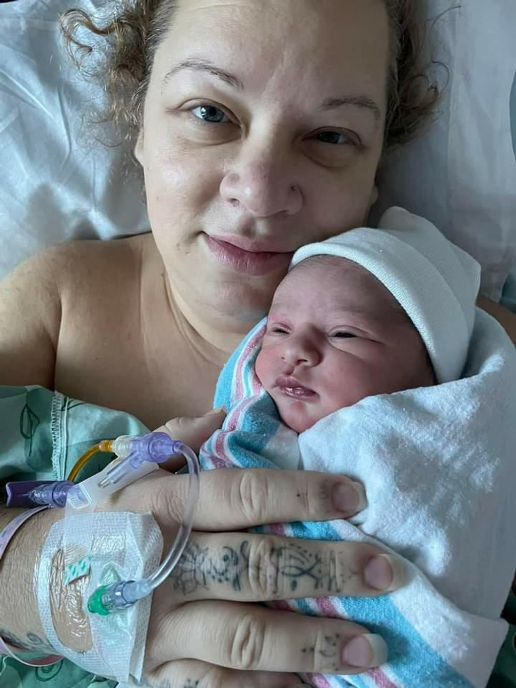 Woman welcomes surprise baby at 45 after mistaking pregnancy for