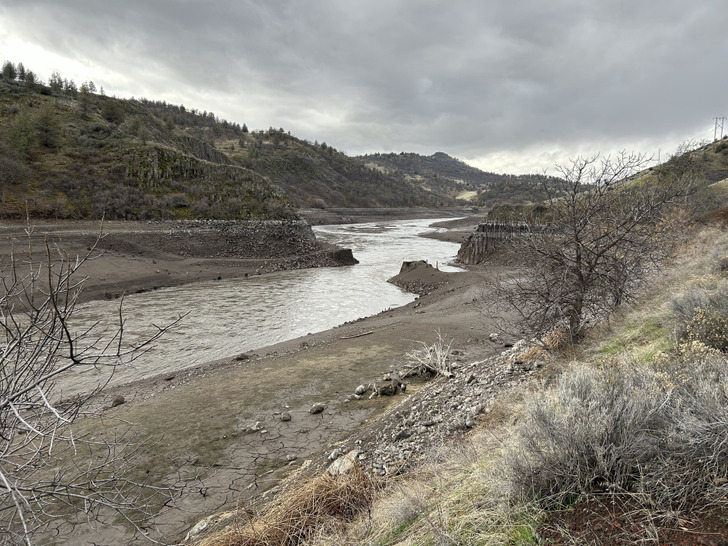 The drained Iron Gate reservoir, a free-flowing river again, January 2024