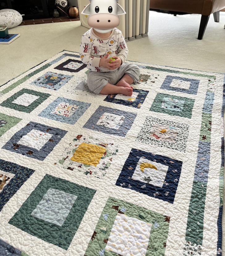 A Toddler Seemed to Recognize His Old Baby Clothes in His New Quilt