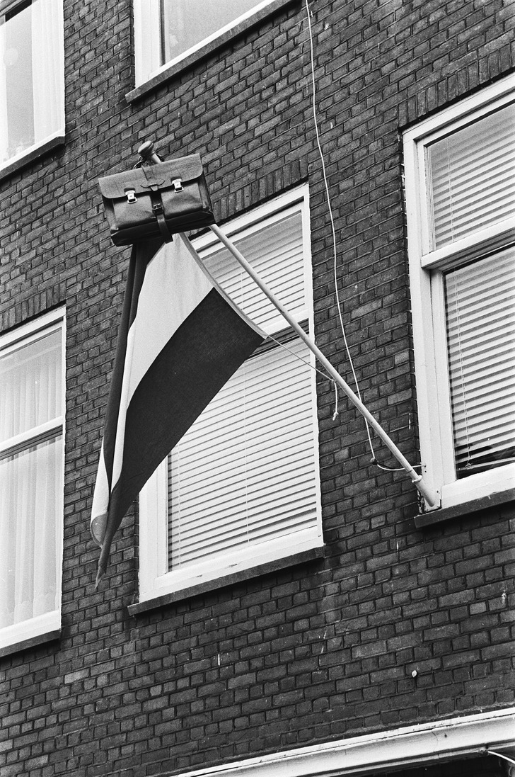 A schoolbag on a flagpole after the final exams, May 30, 1979