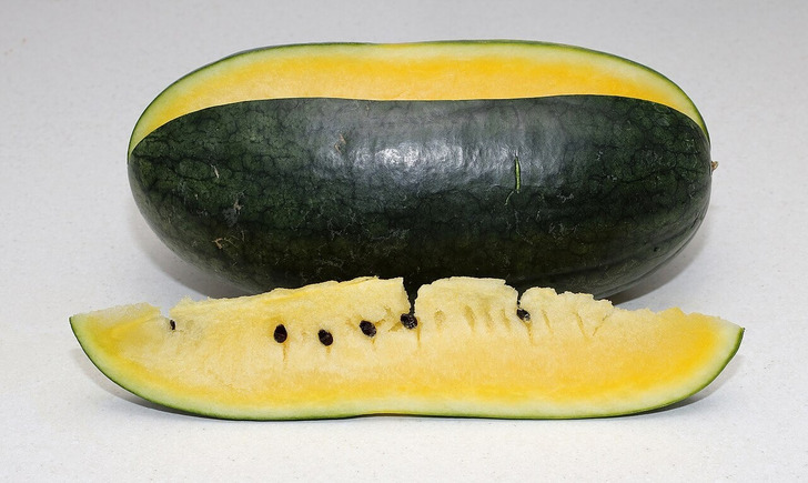 A dark-rind heirloom-style watermelon (illustrative photo, not the Moon and Stars)