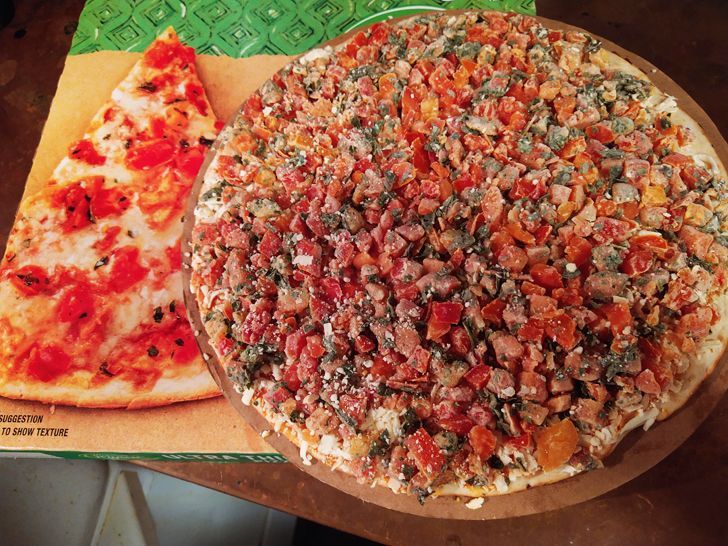 A comparison of the photo of a frozen pizza package and the real pizza, with more topping than the photo.