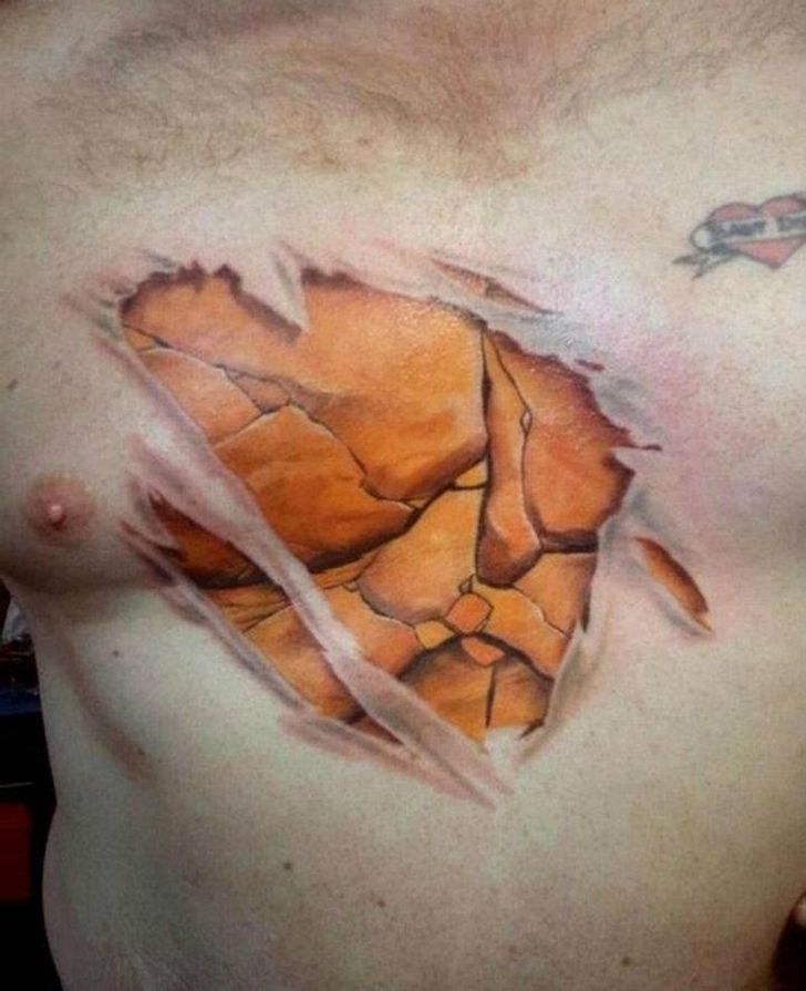 15+ Tattoos You’ll Have to Look at Twice to Understand