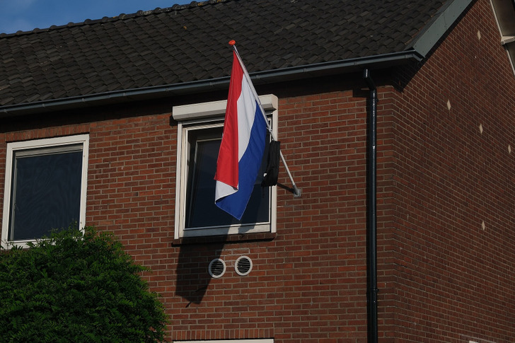A Dutch flag with a schoolbag after the exams, June 20, 2025
