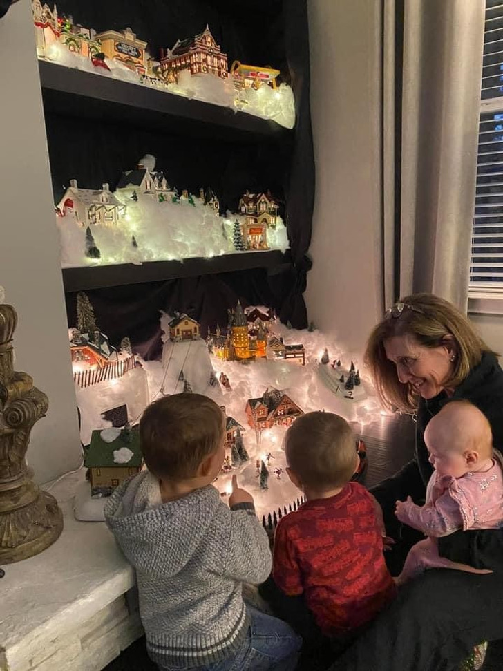 It Started With One House That Looked Like Their Own, and Now the Grandkids Ride Mr. Snowman on the Train