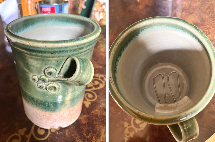 A green ceramic cup from the outside and from the inside, with metal hooks.