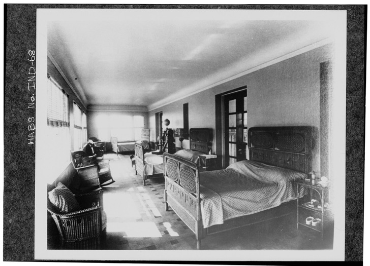 A sleeping porch “capable of sleeping six” in an Indianapolis mansion, about 1916