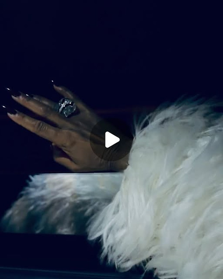 A Long, Shaggy White Coat, Like Tracee Ellis Ross