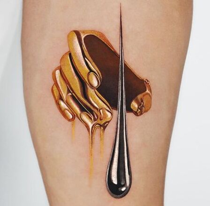 Gold Ink Tattoo