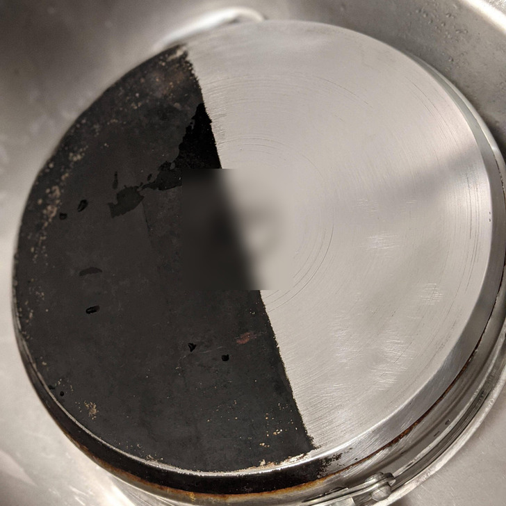 One Side of a Pan Scrubbed After Many Years, in About 90 Minutes