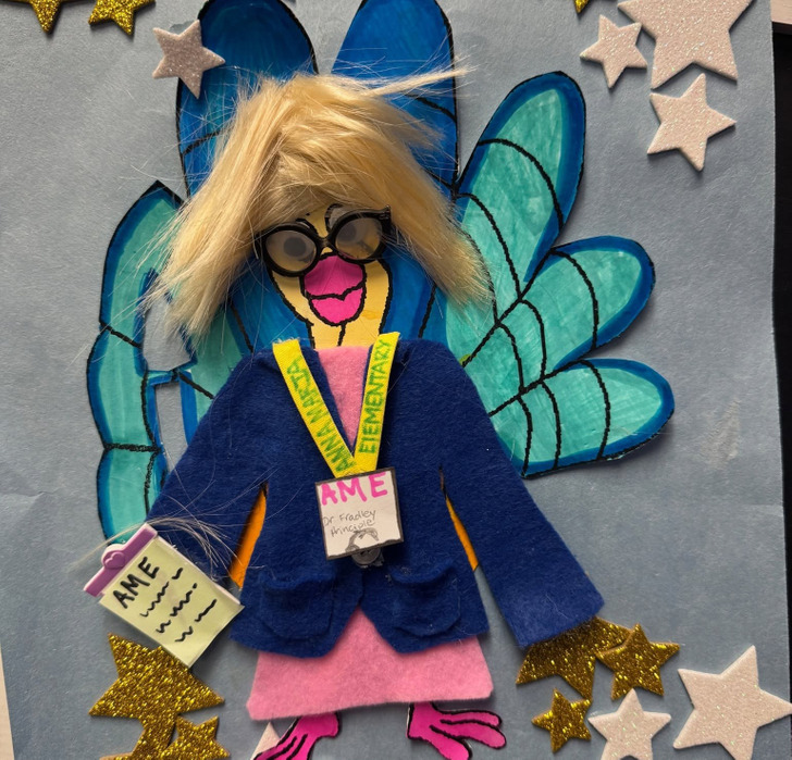 A Turkey With a Blond Wig, Glasses and a School Badge That Looks a Lot Like the Principal