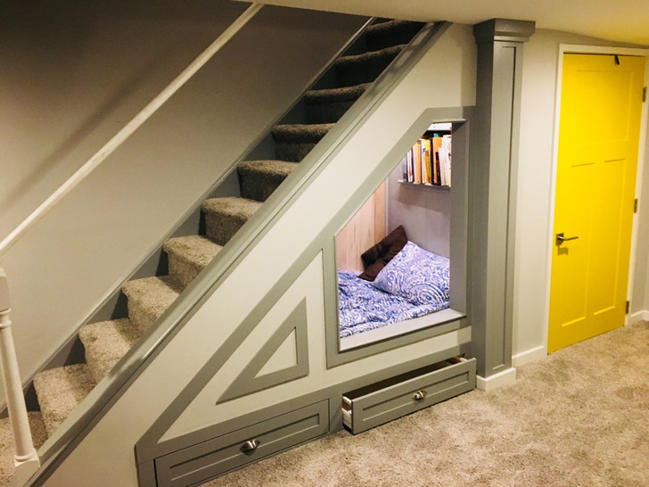 A Twin Bed Under the Basement Stairs That Once Housed a Brother for 3 Months
