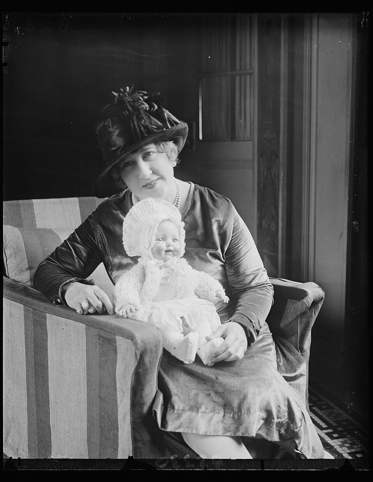 Beulah Louise Henry with one of her inventions, a doll, 1927