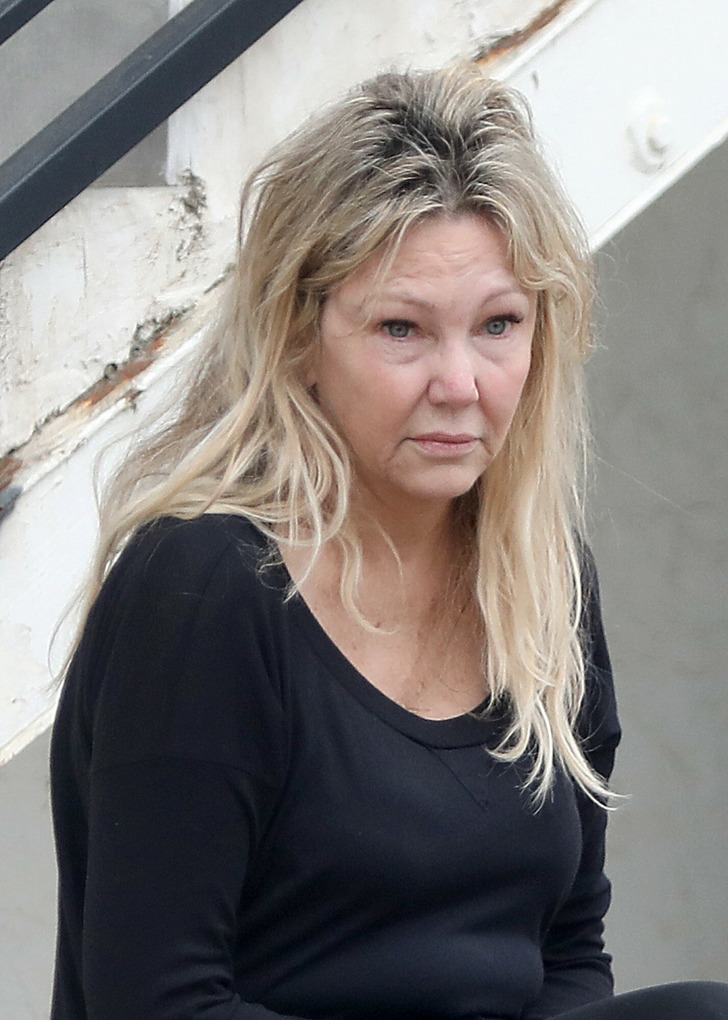 Heather Locklear Looks Unrecognizable as She’s Spotted Waiting for Her