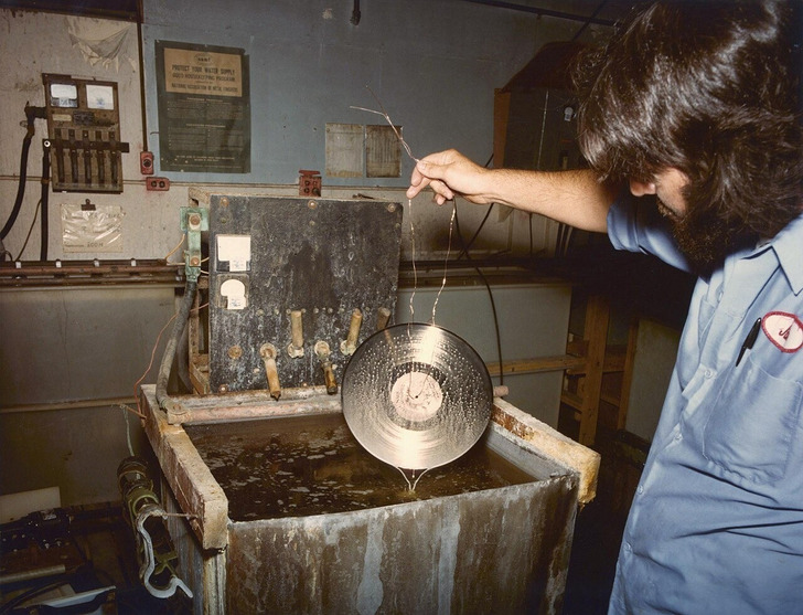 A Voyager Golden Record being gold-plated, 1977
