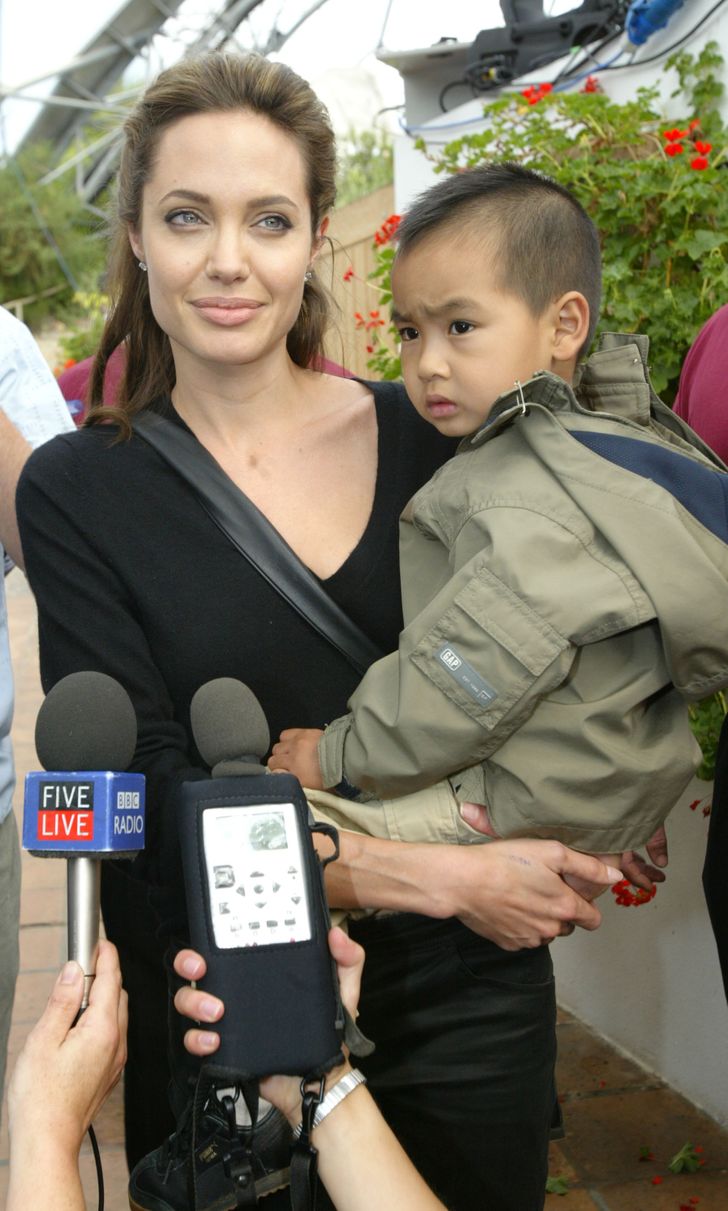 Angelina Jolie has son Maddox by her side as she leaves Washington DC