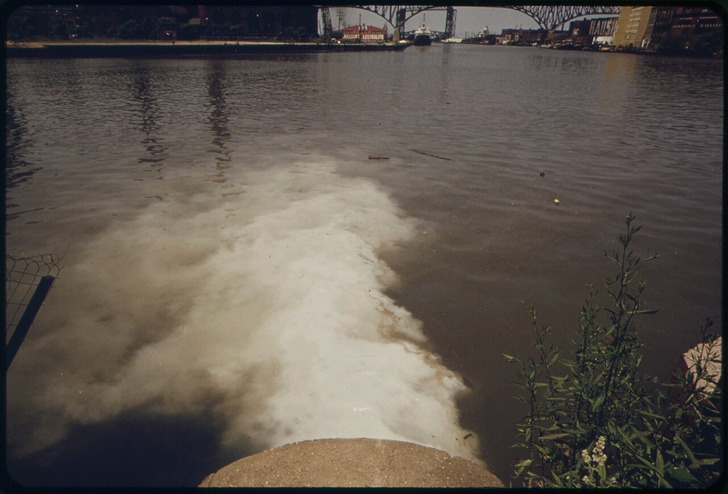 A pump station pipe running into the Cuyahoga, 1973