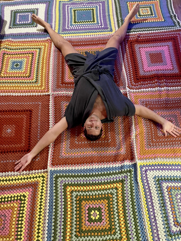 A Granny Square Blanket So Big It Needed a 6’5” Boyfriend for Scale