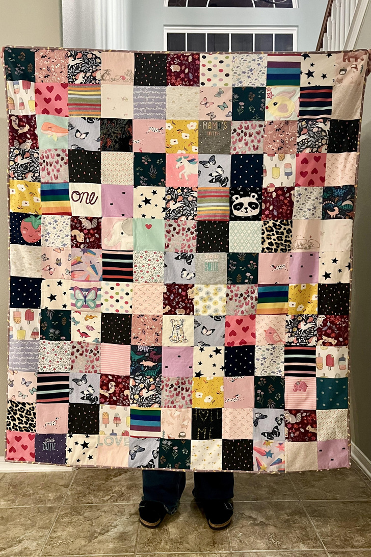 A Parent’s First Quilt Took 55 Squares of Onesies and Toddler Dresses From Two Daughters