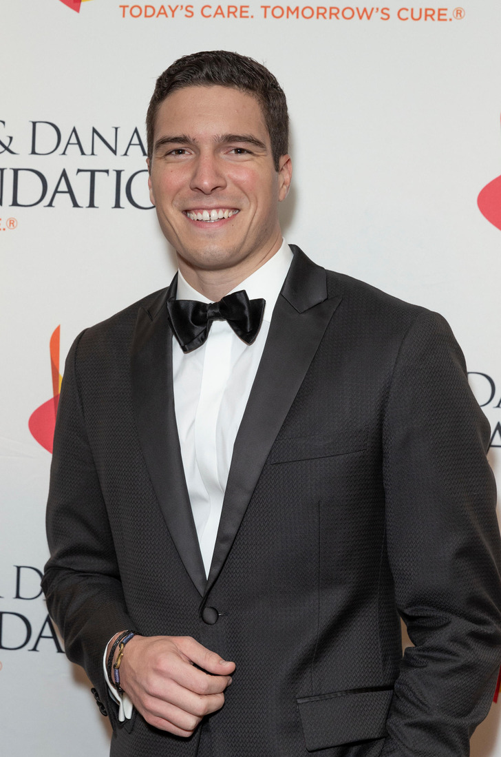 Will Reeve wearing a black suit and bow tie.