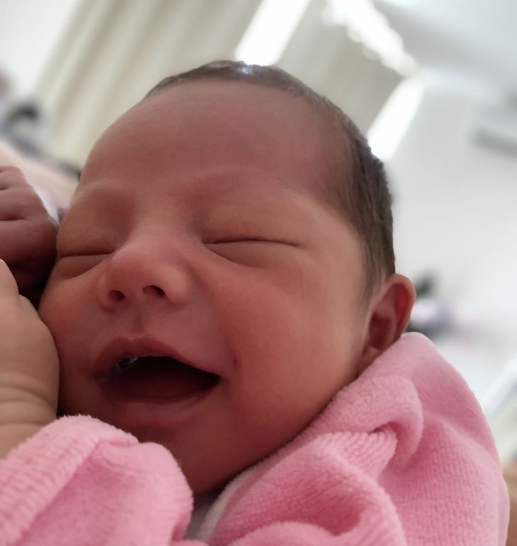 Why Newborns Smile When They’re Sound Asleep