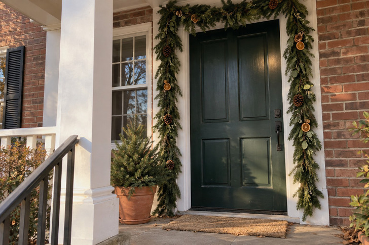 A Garland Around the Door Is Replacing the Wreath